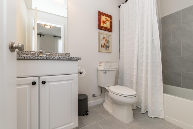 bathroom with tile patterned flooring, baseboards, toilet, vanity, and shower / bathtub combination with curtain