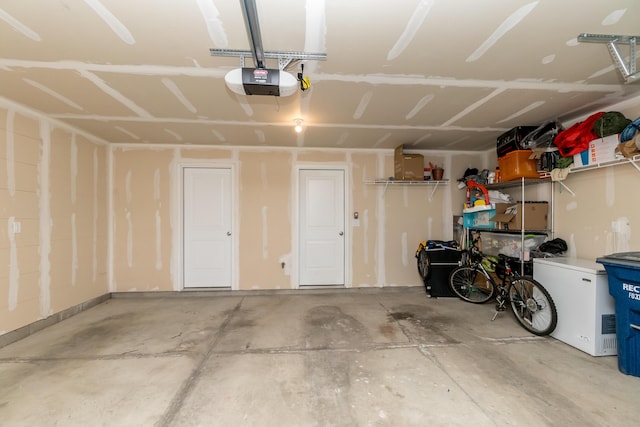 garage featuring a garage door opener