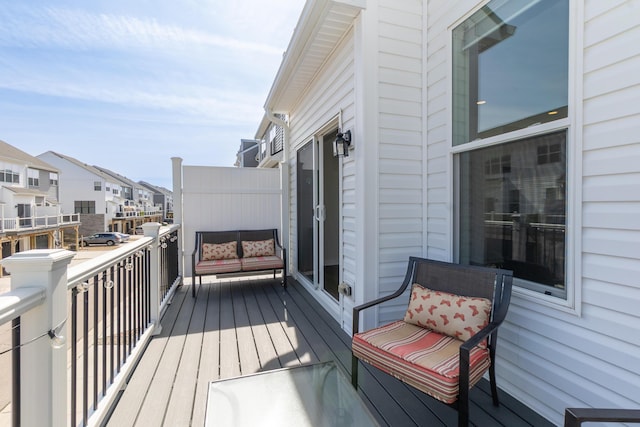 balcony featuring a residential view