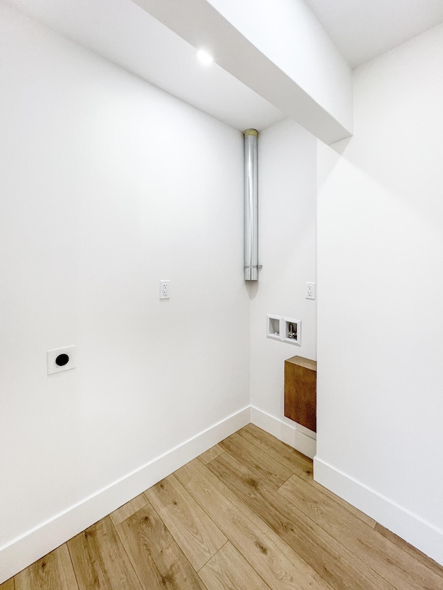 laundry room with baseboards, light wood-type flooring, laundry area, hookup for a washing machine, and hookup for an electric dryer