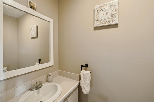 half bath with toilet and vanity