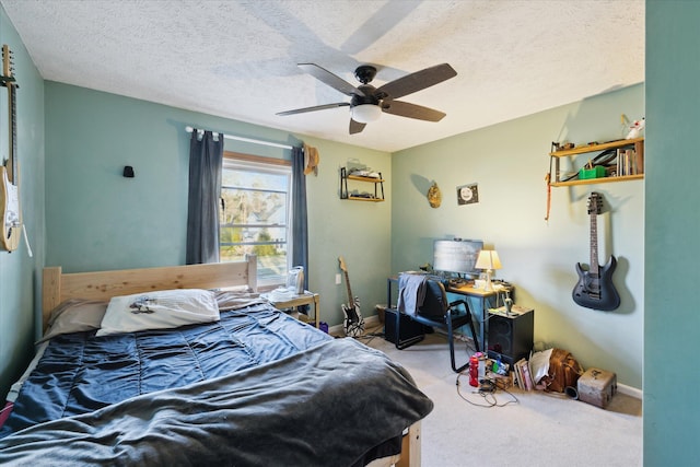 bedroom featuring baseboards, carpet, ceiling fan, and a textured ceiling