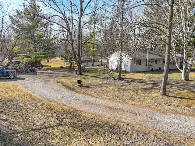 view of road with driveway