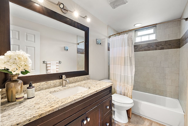 bathroom featuring visible vents, toilet, shower / bath combo, tile patterned floors, and vanity