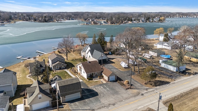 bird's eye view featuring a residential view and a water view