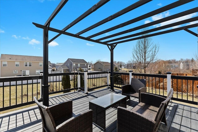 wooden deck with outdoor lounge area, a pergola, and a residential view