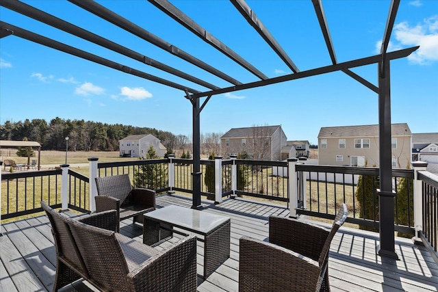 deck featuring a pergola, a residential view, and an outdoor hangout area