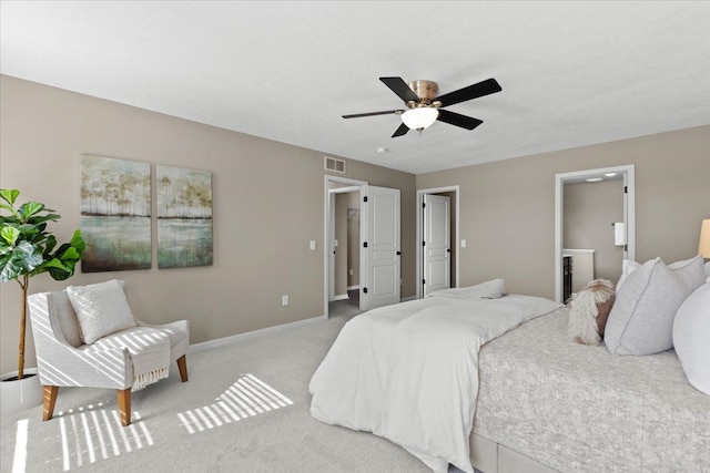 bedroom featuring visible vents, carpet floors, baseboards, and a ceiling fan