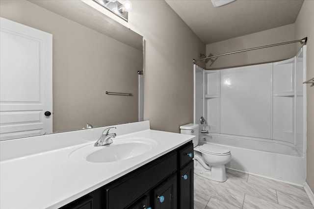 bathroom featuring vanity, bathtub / shower combination, a textured ceiling, toilet, and marble finish floor