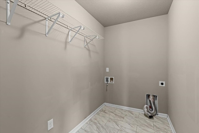 laundry area with hookup for a washing machine, baseboards, laundry area, electric dryer hookup, and marble finish floor