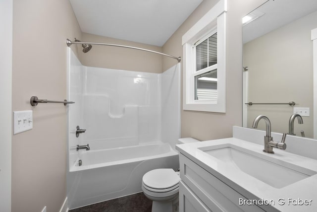 full bath featuring vanity, toilet, and shower / bathing tub combination