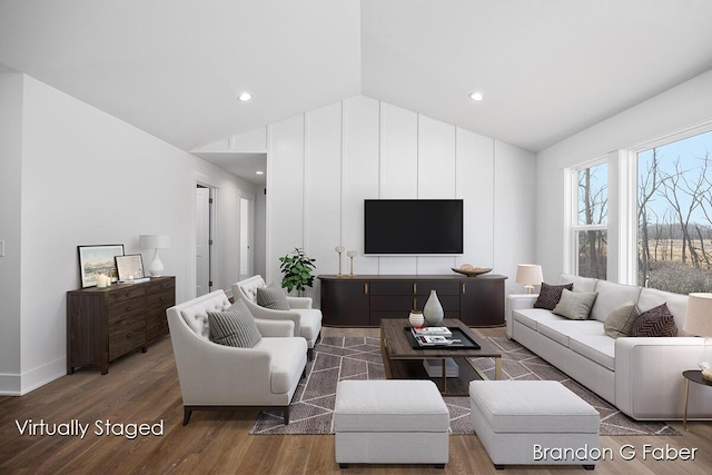 living area featuring recessed lighting, lofted ceiling, and wood finished floors