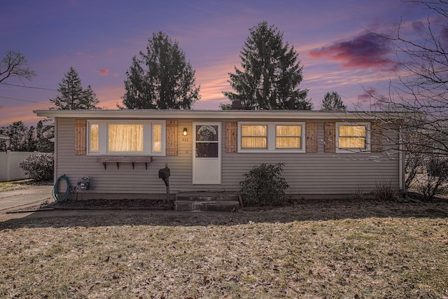 view of front of home with fence