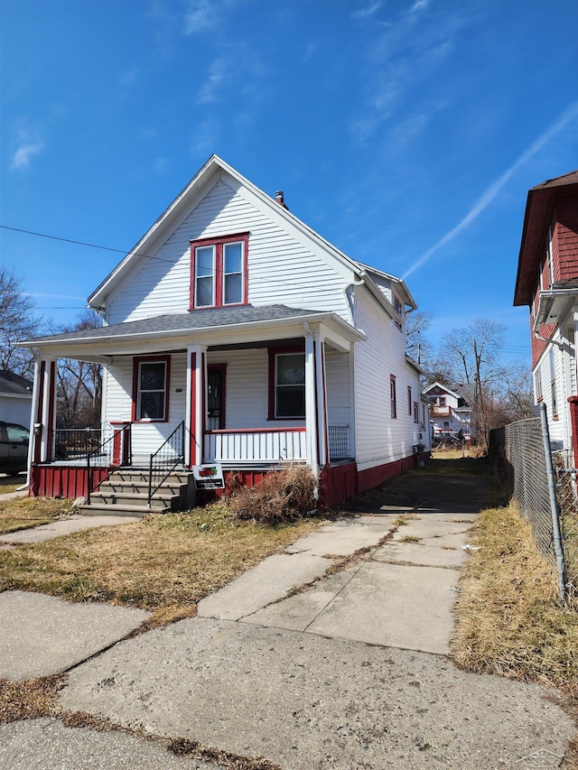 view of front of home with a porch and concrete driveway