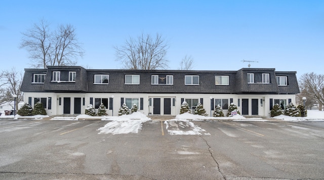 189 Buchanan St, Hudson, MI 49247 - view of building exterior featuring uncovered parking