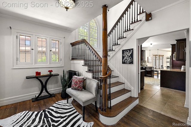 19344 Strathcona Dr, Detroit, MI 48203 - staircase featuring hardwood / wood-style floors and crown molding