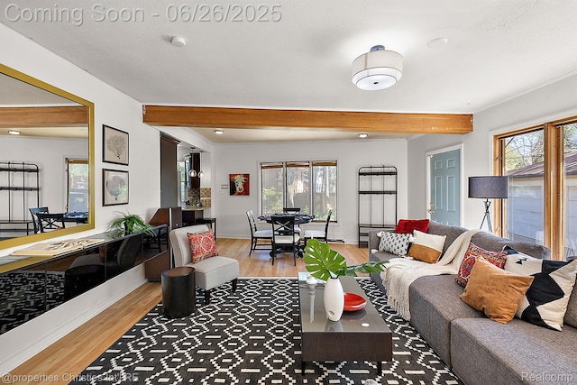 19344 Strathcona Dr, Detroit, MI 48203 - living area featuring wood finished floors, beam ceiling, and recessed lighting