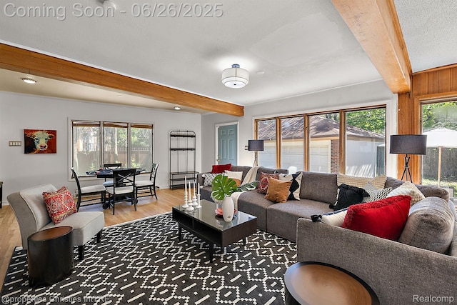 19344 Strathcona Dr, Detroit, MI 48203 - living area featuring beamed ceiling and light wood-type flooring