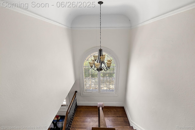 19344 Strathcona Dr, Detroit, MI 48203 - stairway featuring a chandelier and wood finished floors