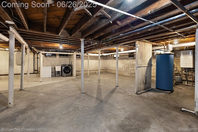 19344 Strathcona Dr, Detroit, MI 48203 - unfinished below grade area featuring water heater, washing machine and dryer, and electric panel
