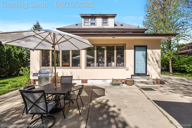 19344 Strathcona Dr, Detroit, MI 48203 - view of patio featuring entry steps, area for grilling, and outdoor dining area