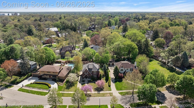 19344 Strathcona Dr, Detroit, MI 48203 - aerial perspective of suburban area with a heavily wooded area