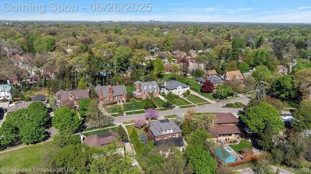 19344 Strathcona Dr, Detroit, MI 48203 - aerial view of property and surrounding area with nearby suburban area and a heavily wooded area