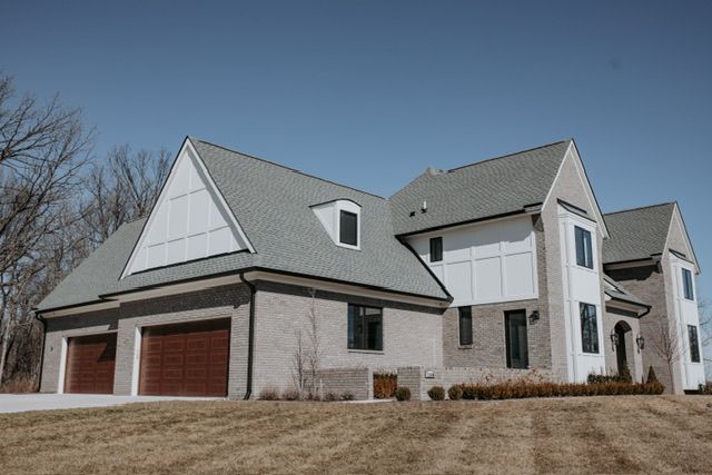 72460 Henry D Dr, Romeo, MI 48065 - exterior space featuring brick siding, a lawn, and a shingled roof