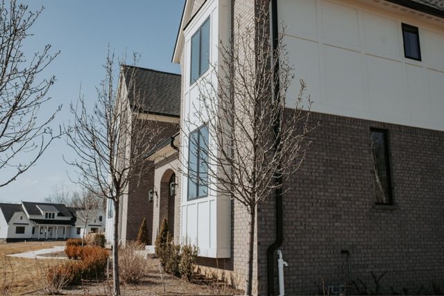 72460 Henry D Dr, Romeo, MI 48065 - view of property exterior with brick siding