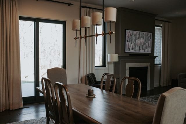 72460 Henry D Dr, Romeo, MI 48065 - dining area featuring wood finished floors and a fireplace