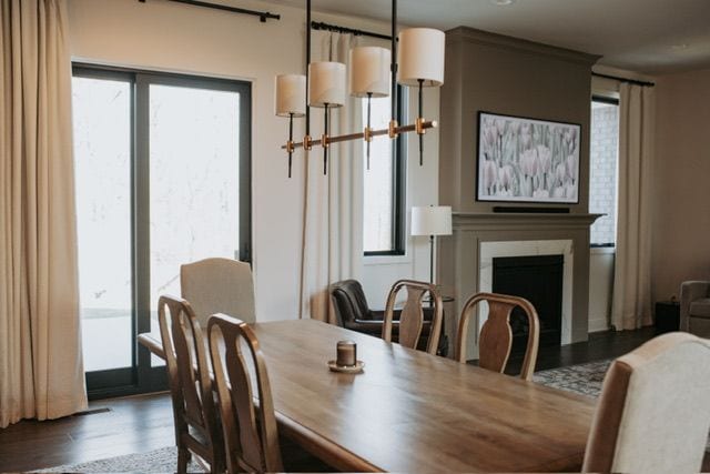 72460 Henry D Dr, Romeo, MI 48065 - dining area featuring wood finished floors and a fireplace