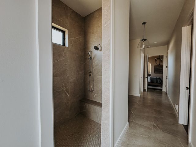 72460 Henry D Dr, Romeo, MI 48065 - bathroom with baseboards and tiled shower