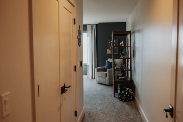 72460 Henry D Dr, Romeo, MI 48065 - hallway featuring baseboards and carpet floors