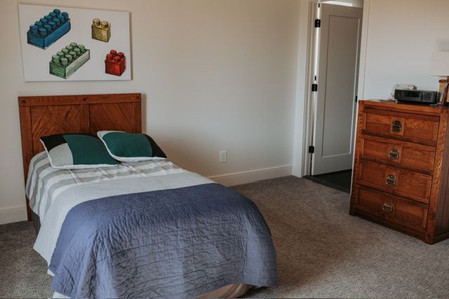 72460 Henry D Dr, Romeo, MI 48065 - carpeted bedroom featuring baseboards