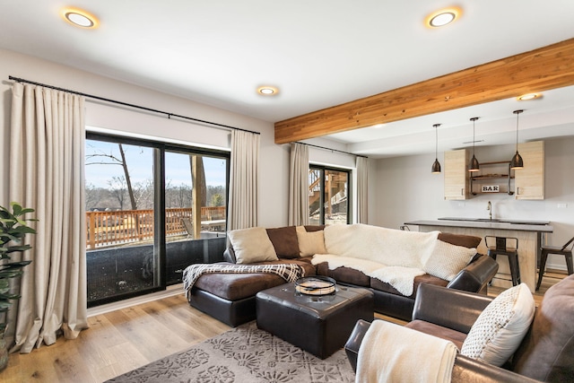 2060 S Algonquin Dr, Benton Harbor, MI 49022 - living area with beam ceiling, plenty of natural light, light wood-style floors, and recessed lighting