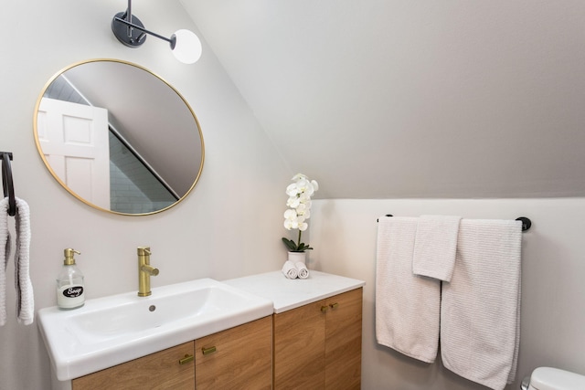 2060 S Algonquin Dr, Benton Harbor, MI 49022 - bathroom featuring vanity and lofted ceiling