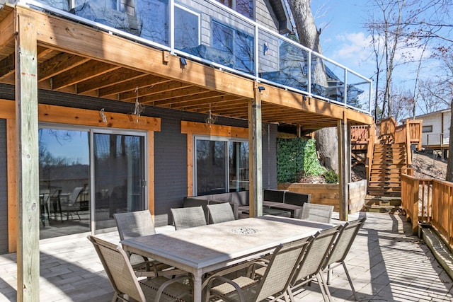 2060 S Algonquin Dr, Benton Harbor, MI 49022 - deck featuring stairs, outdoor dining space, and a patio area