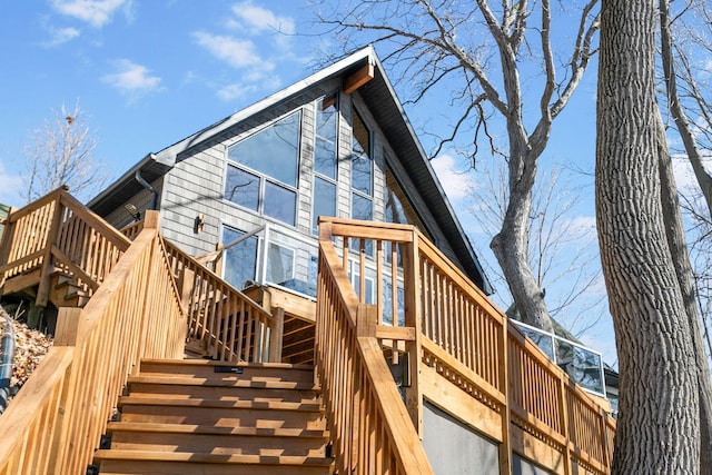 2060 S Algonquin Dr, Benton Harbor, MI 49022 - back of property with stairs and a wooden deck