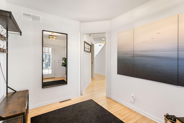 2060 S Algonquin Dr, Benton Harbor, MI 49022 - hall with light wood-type flooring and baseboards