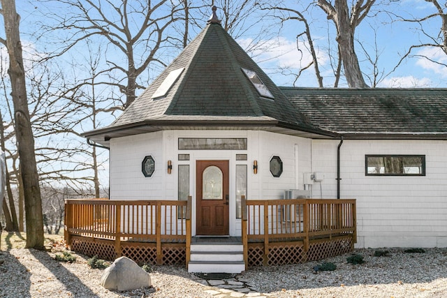 2060 S Algonquin Dr, Benton Harbor, MI 49022 - view of front of property featuring roof with shingles and a wooden deck