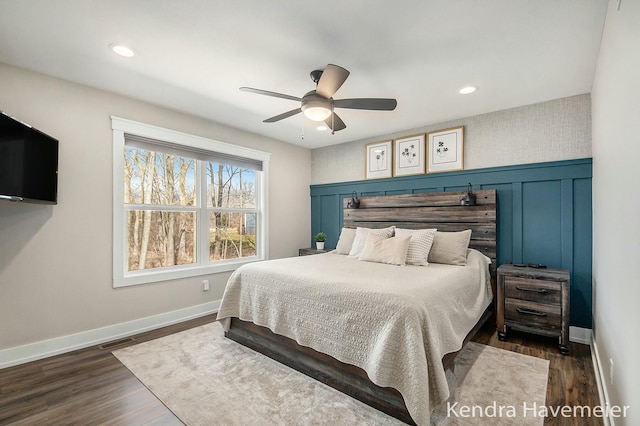 bedroom featuring recessed lighting, visible vents, dark wood-style flooring, and baseboards