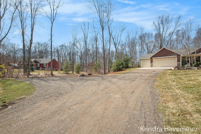 view of street featuring driveway