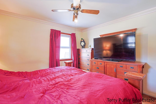 bedroom featuring ornamental molding and a ceiling fan