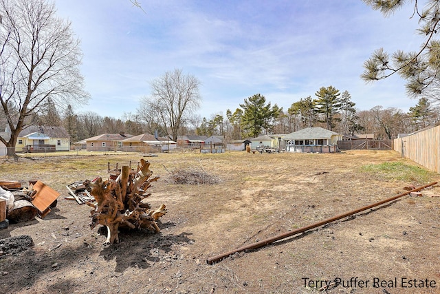 view of yard with fence