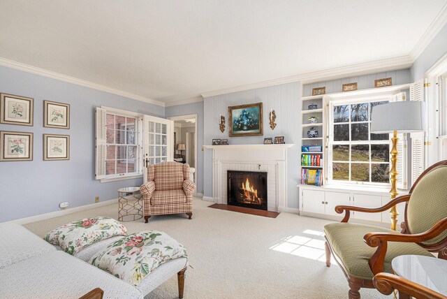interior space with carpet floors, ornamental molding, and a wealth of natural light