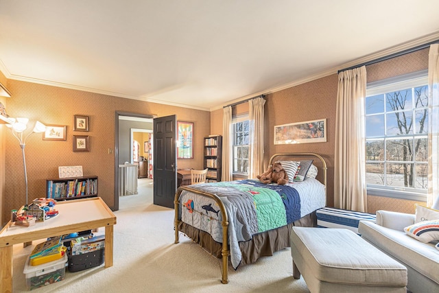 bedroom featuring multiple windows, ornamental molding, and light colored carpet