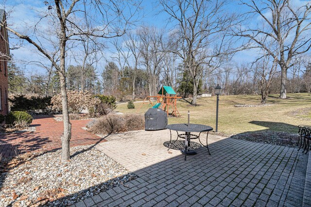 view of patio / terrace featuring a playground