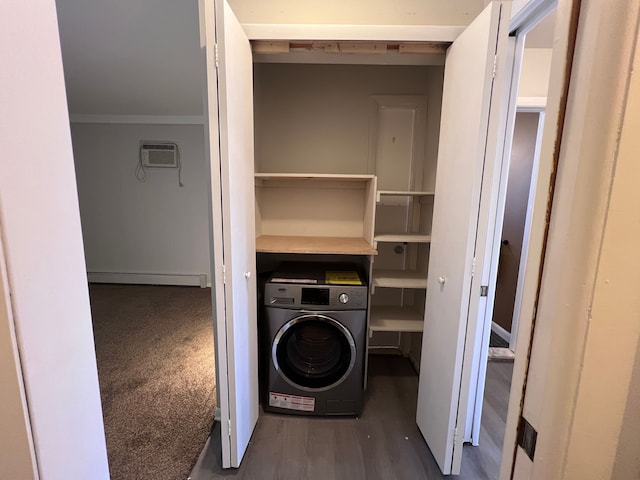 washroom featuring laundry area, washer / clothes dryer, a wall mounted air conditioner, crown molding, and baseboard heating