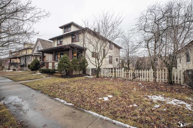 view of property exterior with fence