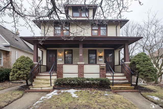 traditional style home with covered porch